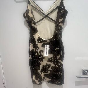 Meek bodycon night out dress with low back and adjustable straps